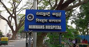 Signboard of NIMHANS Hospital, displaying the name and logo and here is vaccant post of Psychiatric Nursing Jobs